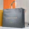 69305947f09edb6de4c4f883 M24457 M24475 This Medium Shopper Handbag Draws Inspiration from Louis Vuitton's Shopping Tote