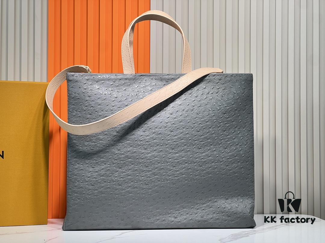 69305948f09edb6de4c4f885 M24457 M24475 This Medium Shopper Handbag Draws Inspiration from Louis Vuitton's Shopping Tote