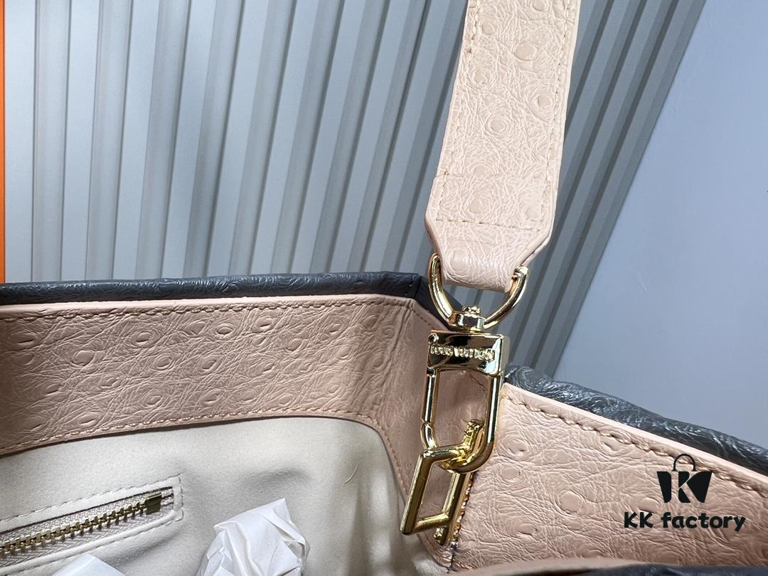 6930594af09edb6de4c4f888 M24457 M24475 This Medium Shopper Handbag Draws Inspiration from Louis Vuitton's Shopping Tote