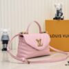 6930596cf09edb6de4c4f8c1 Exclusive Real Photo - Upgraded Version ‼️⭐️ M21720 Black, M21797 White ⭐️ This Hold Me Handbag is a new addition to Louis Vuitton's iconic New Wave quilted leather collection, featuring a refined silhouette and comfortable carry. The smooth-textured body is adorned with an elegant LV metal clasp. The detachable and adjustable leather strap enhances the bag’s versatility.