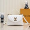 69305971f09edb6de4c4f8ca Exclusive Real Shot - Upgraded Version ‼️⭐️ M21720 Black, M21797 White ⭐️ This Hold Me Handbag is a new addition to Louis Vuitton's iconic New Wave quilted leather collection, featuring a refined silhouette and comfortable carry. The smooth-textured body is accented with an elegant LV metal clasp. An detachable and adjustable leather strap enhances the bag’s versatility.