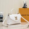 69305973f09edb6de4c4f8cd Exclusive Real Shot - Upgraded Version ‼️⭐️ M21720 Black, M21797 White ⭐️ This Hold Me Handbag is a new addition to Louis Vuitton's iconic New Wave quilted leather collection, featuring a refined silhouette and comfortable carry. The smooth-textured body is accented with an elegant LV metal clasp. An detachable and adjustable leather strap enhances the bag’s versatility.