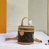 Upgraded Original Version [Exclusive Real Photo M82952 Monogram Yellow Flower] This Nano Cannes Handbag features a cylindrical silhouette crafted from Monogram canvas, echoing the design of a makeup pouch.