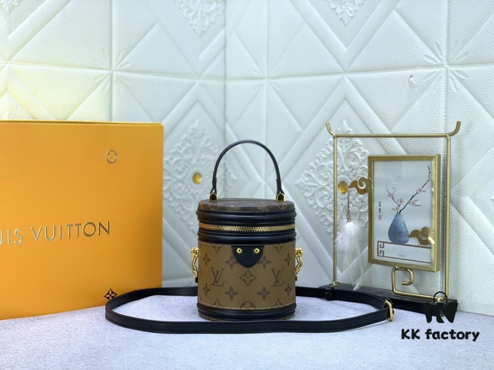 Upgraded Original Version [Exclusive Real Photo M82952 Monogram. Yellow Flower] This Nano Cannes Handbag features a cylindrical silhouette cut from Monogram canvas, echoing the design of a makeup pouch.