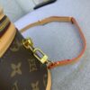 Upgraded Original Version [Exclusive Real Photo M82952 Monogram. Yellow Flower] This Nano Cannes Handbag features a cylindrical silhouette crafted from Monogram canvas, echoing the design of a makeup pouch.