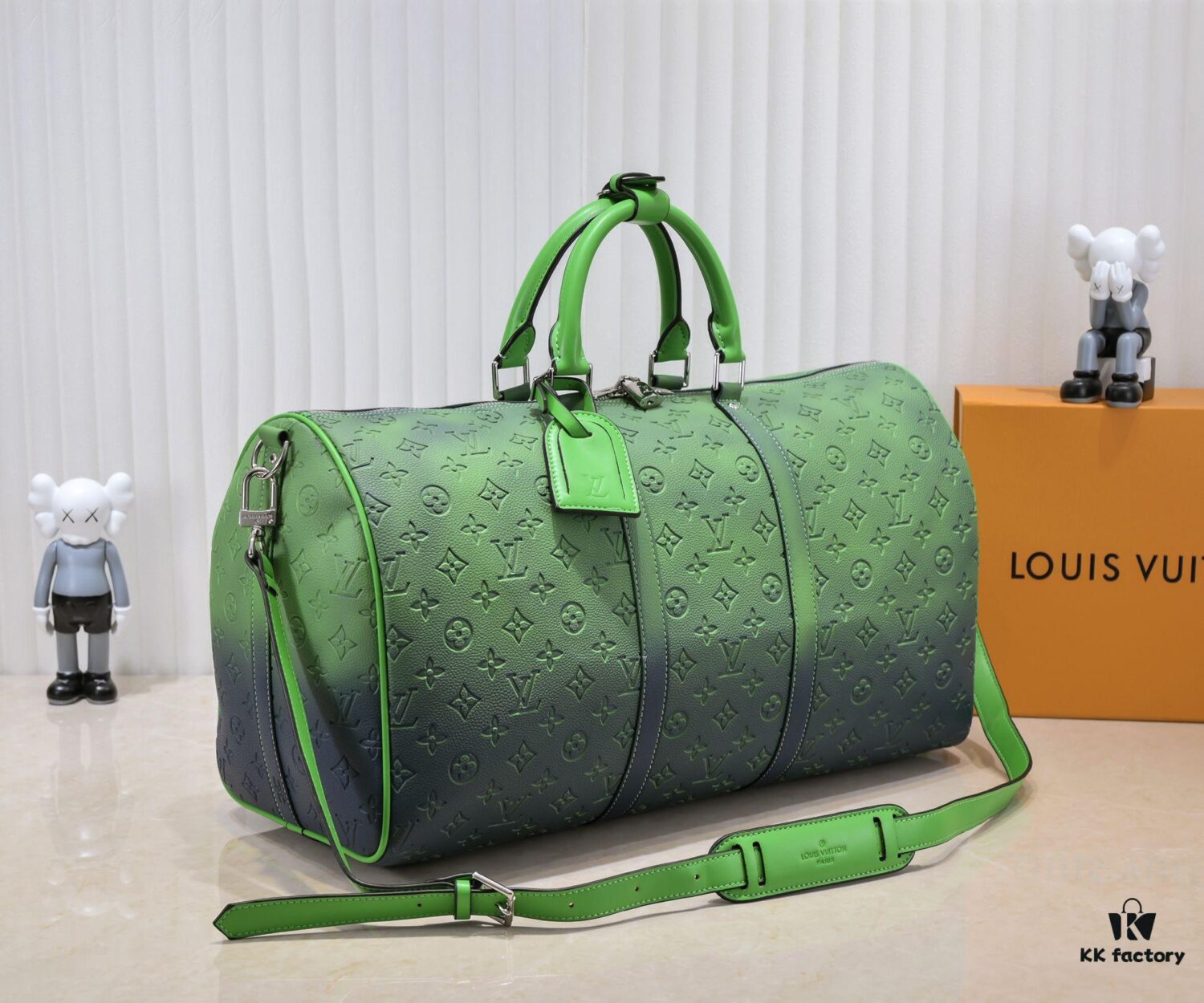 69305b40f09edb6de4c4fbc0 Louis Vuitton Keepall Bandoulière 41 in Taurillon Illusion Leather