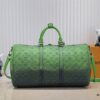 69305b41f09edb6de4c4fbc3 Louis Vuitton Keepall Bandoulière 41 in Taurillon Illusion Leather