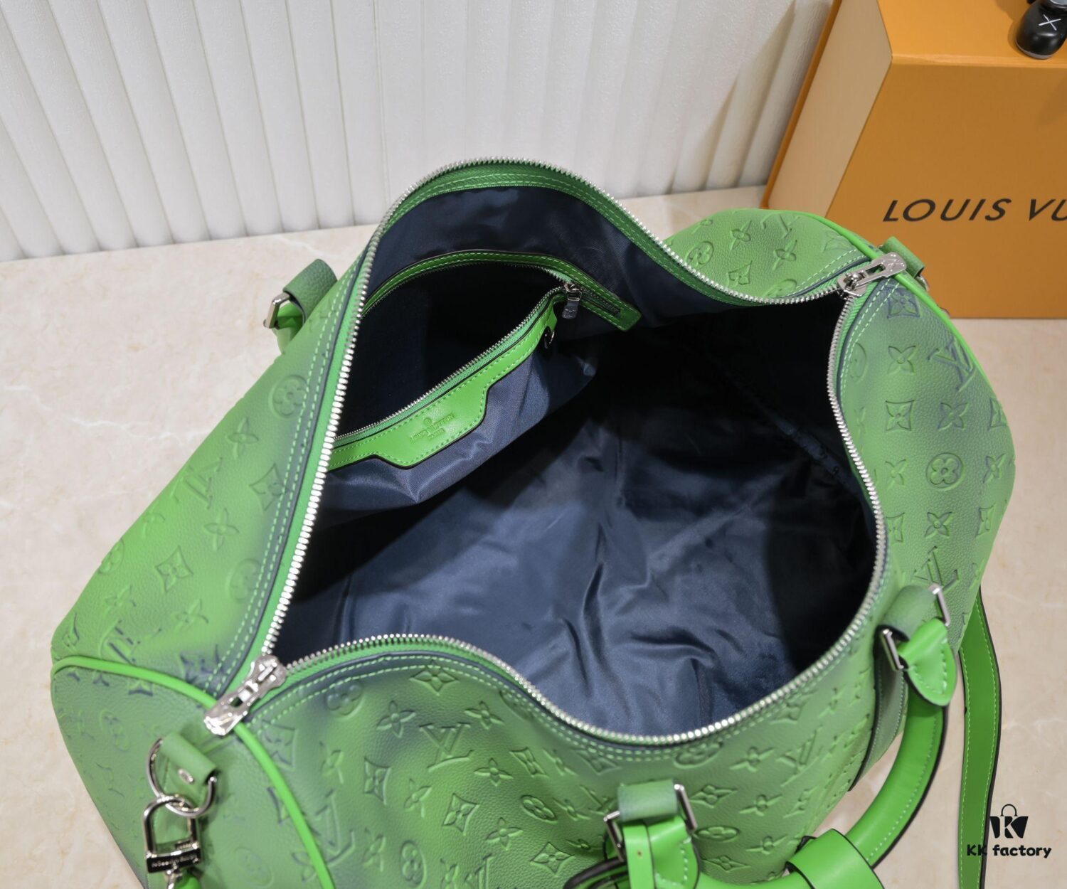 69305b42f09edb6de4c4fbc5 Louis Vuitton Keepall Bandoulière 41 in Taurillon Illusion Leather