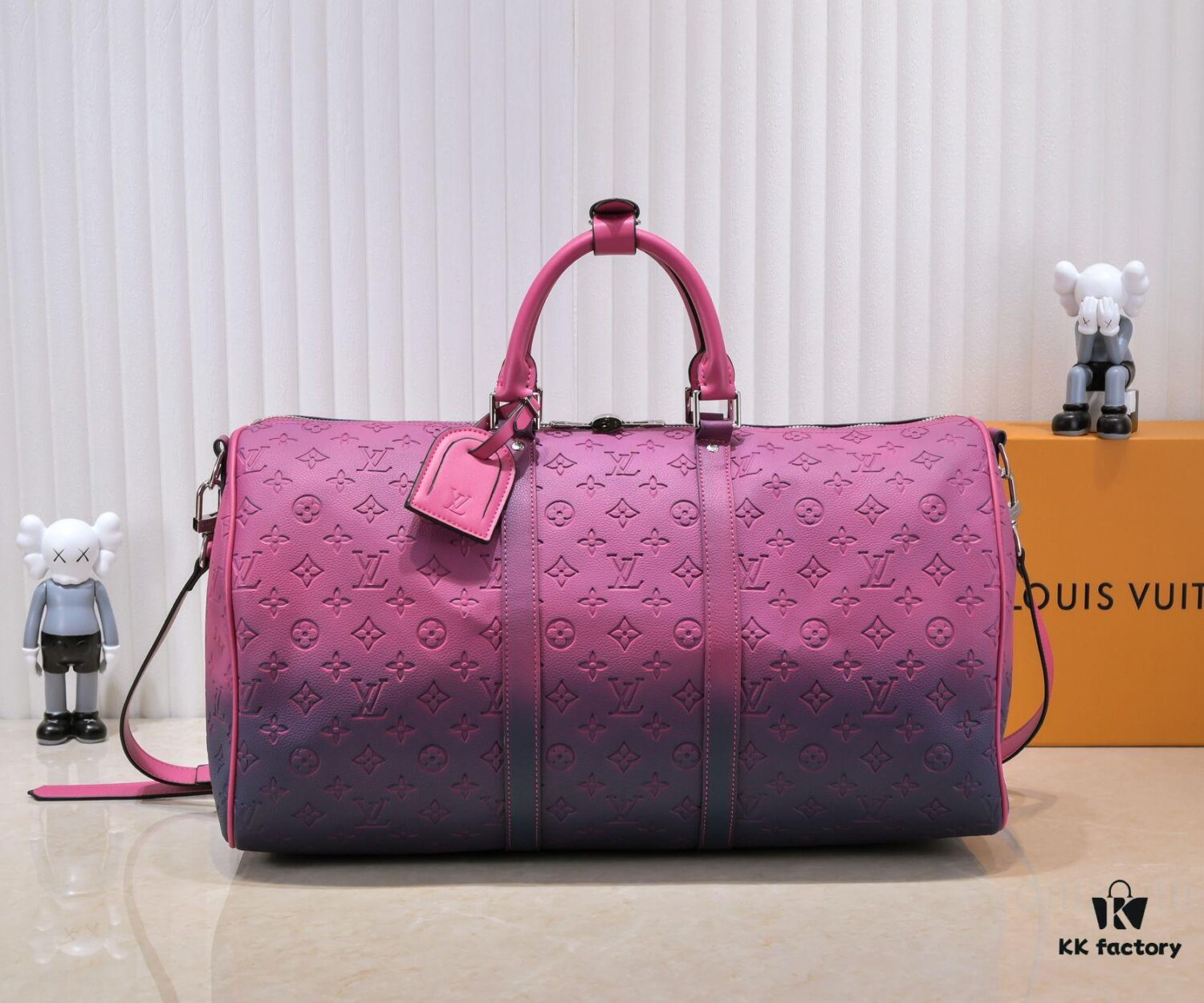 69305b42f09edb6de4c4fbc6 Louis Vuitton Keepall Bandoulière 40 in Taurillon Illusion Leather