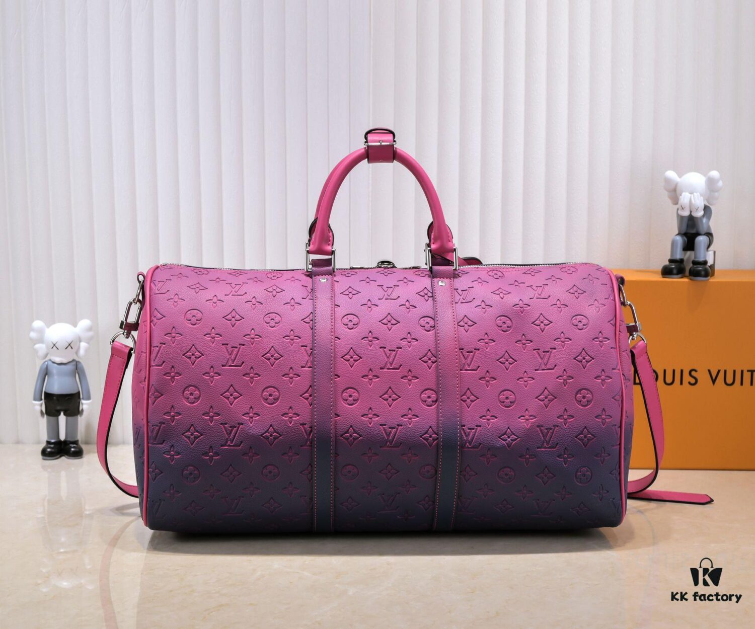 69305b48f09edb6de4c4fbcf Louis Vuitton Keepall Bandoulière 40 in Taurillon Illusion Leather