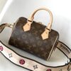 M46222 Beige M46234 Black [M45957 Black Adjustable Strap Not Available] ~ This Speedy Bandoulière 20 Handbag is crafted from Monogram canvas with cowhide leather trim and textile lining, continuing the iconic Louis Vuitton Speedy travel bag design in a compact size, featuring rolled leather handles and a detachable, adjustable fabric shoulder strap accented with signature woven branding details