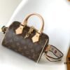 M46222 Beige M46234 Black [M45957 Black Adjustable Strap Not Available] ~ This Speedy Bandoulière 20 Handbag features Monogram canvas, cowhide leather trim, and textile lining, continuing the classic Louis Vuitton Speedy travel bag design in a compact size, complemented by rolled leather handles and a detachable, adjustable fabric shoulder strap adorned with brand logo weave