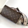 M46222 Beige M46234 Black [M45957 Black Adjustable Strap Not Available] ~ This Speedy Bandoulière 20 Handbag features Monogram canvas, cowhide leather trim, and textile lining, continuing the classic Louis Vuitton Speedy travel bag design in a compact size, complemented by rolled leather handles and a detachable, adjustable fabric shoulder strap adorned with brand logo weave