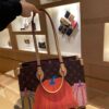 69305dcef09edb6de4c50036 M46467 M45654 LV x YK OnTheGo Small Handbag