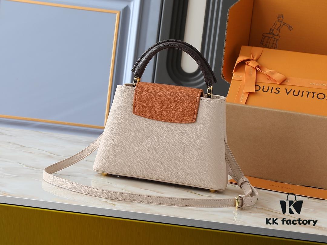 69305e0af09edb6de4c500b6 Guangzhou Goods Upgrade Original Version M12956 M12952 M14176 This Mini Capucines Bag Features Luxurious Taurillon Cowhide Leather in a Refined Seasonal Hue, Accentuated with Shining Metal Hardware and the LV Initials as a Signature Detail. The Flap Can Be Worn Externally or Tucked Inside to Reveal a Well-Organized Interior, While the Zippered Pocket Offers Secure Storage for Valuables. The Detachable and Adjustable Shoulder Strap Allows for Versatile Carrying Options. Dimensions: 27.0 x 17.3 x 9.0 cm (L x H x W)