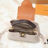 69305e0bf09edb6de4c500ba Guangzhou Goods Upgrade Original Version M12956 M12952 M14176 This Mini Capucines Bag Features Luxurious Taurillon Cowhide Leather in a Refined Seasonal Hue, Accentuated with Shining Metal Hardware and the LV Initials as a Signature Detail. The Flap Can Be Worn Externally or Tucked Inside to Reveal a Well-Organized Interior, While the Zippered Pocket Offers Secure Storage for Valuables. The Detachable and Adjustable Shoulder Strap Allows for Versatile Carrying Options. Dimensions: 27.0 x 17.3 x 9.0 cm (L x H x W)