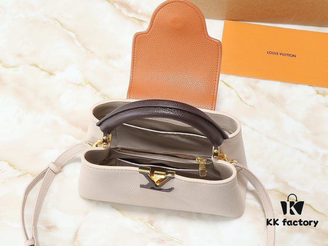 69305e0bf09edb6de4c500ba Guangzhou Goods Upgrade Original Version M12956 M12952 M14176 This Mini Capucines Bag Features Luxurious Taurillon Cowhide Leather in a Refined Seasonal Hue, Accentuated with Shining Metal Hardware and the LV Initials as a Signature Detail. The Flap Can Be Worn Externally or Tucked Inside to Reveal a Well-Organized Interior, While the Zippered Pocket Offers Secure Storage for Valuables. The Detachable and Adjustable Shoulder Strap Allows for Versatile Carrying Options. Dimensions: 27.0 x 17.3 x 9.0 cm (L x H x W)