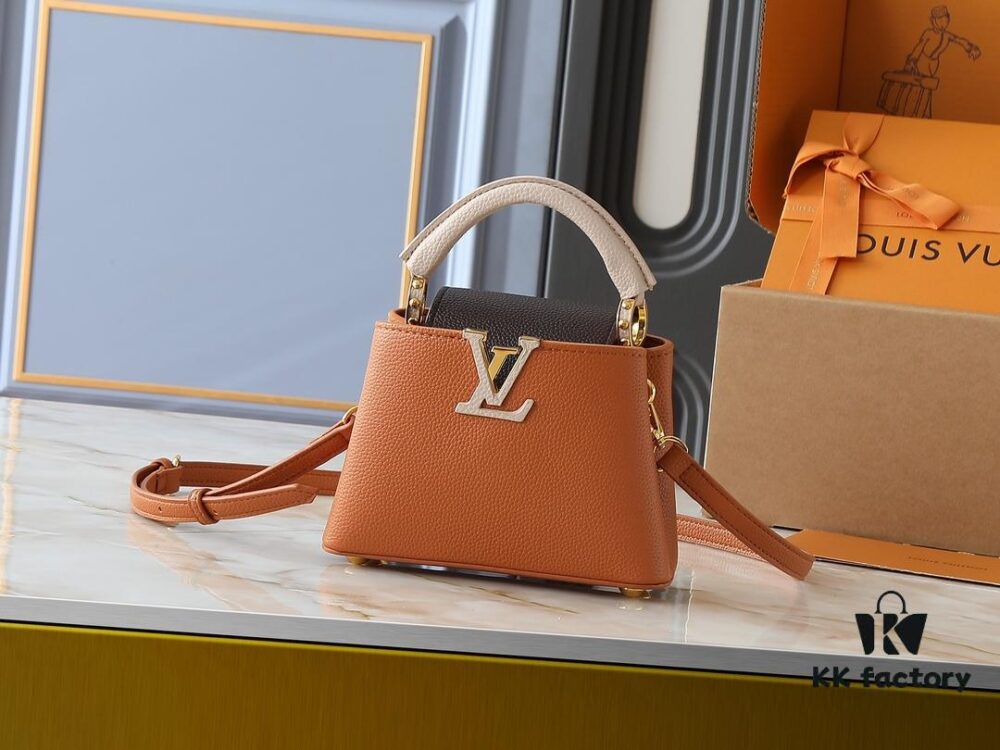 69305e0ff09edb6de4c500c2 Guangzhou Goods Upgraded Original Version M12956 M12952 M14176 This Mini Capucines Handbag in Elegant Taurillon Calfskin with Shiny Metal Hardware and LV Letter Accent