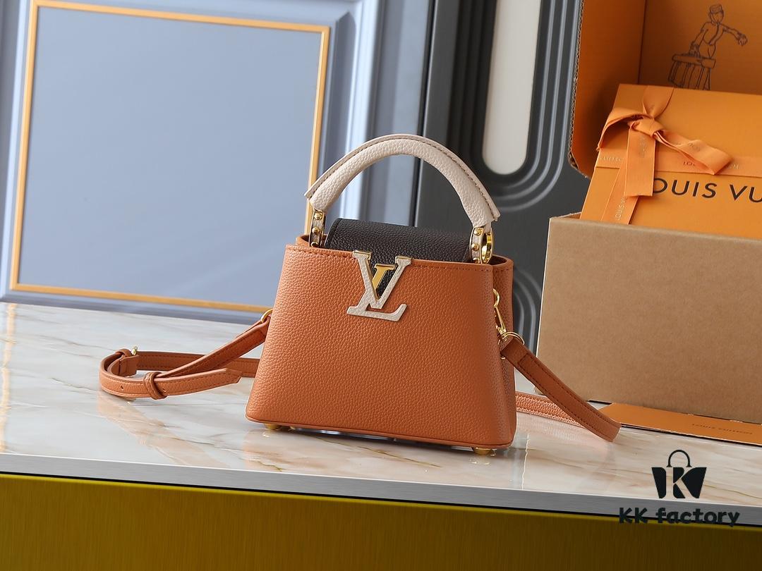 69305e0ff09edb6de4c500c2 Guangzhou Goods Upgraded Original Version M12956 M12952 M14176 This Mini Capucines Handbag in Elegant Taurillon Calfskin with Shiny Metal Hardware and LV Letter Accent