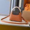 69305e13f09edb6de4c500c7 Guangzhou Goods Upgraded Original Version M12956 M12952 M14176 This Mini Capucines Handbag in Elegant Taurillon Calfskin with Shiny Metal Hardware and LV Letter Accent