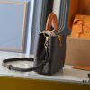 69305e24f09edb6de4c500ea Guangzhou Goods Upgraded Original Version M12956 M12952 M14176 This Mini Capucines Bag Features Elegant Taurillon Calfskin with Seasonal Hues and Shiny Metal LV Lettering