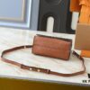 69305edbf09edb6de4c5025d Upgraded Original M21590 M59090 Twist One Handle BB Handbag crafted from deeply dyed Taurillon leather, featuring a top single handle and the iconic LV Twist turn-lock flap closure. The contrasting color leather lining adds a fashionable touch, suitable for crossbody, shoulder, or handheld wear.