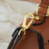 69305edbf09edb6de4c5025e Upgraded Original M21590 M59090 Twist One Handle BB Handbag crafted from deeply dyed Taurillon leather, featuring a top single handle and the iconic LV Twist turn-lock flap closure. The contrasting color leather lining adds a fashionable touch, suitable for crossbody, shoulder, or handheld wear.