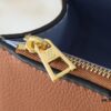 69305edcf09edb6de4c50260 Upgraded Original M21590 M59090 Twist One Handle BB Handbag crafted from deeply dyed Taurillon leather, featuring a top single handle and the iconic LV Twist turn-lock flap closure. The contrasting color leather lining adds a fashionable touch, suitable for crossbody, shoulder, or handheld wear.