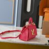 69305eddf09edb6de4c50263 Upgraded Original M21590 M59090 Twist One Handle BB Handbag crafted from deeply dyed Taurillon leather, featuring a top single handle and the iconic LV Twist turn-lock flap closure. The contrast-color leather lining adds a fashionable touch, suitable for crossbody, shoulder, or handheld wear.