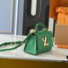 69305ee4f09edb6de4c50276 Upgraded Original M21590 M59090 Twist One Handle BB Handbag crafted from deeply dyed Taurillon leather, featuring a top single handle and the iconic LV Twist turn-lock flap closure. The contrast-color leather lining adds a trendy touch, ideal for crossbody, shoulder, or handheld wear.