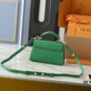 69305ee4f09edb6de4c50277 Upgraded Original M21590 M59090 Twist One Handle BB Handbag crafted from deeply dyed Taurillon leather, featuring a top single handle and the iconic LV Twist turn-lock flap closure. The contrast-color leather lining adds a trendy touch, ideal for crossbody, shoulder, or handheld wear.
