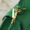 69305ee5f09edb6de4c5027a Upgraded Original M21590 M59090 Twist One Handle BB Handbag crafted from deeply dyed Taurillon leather, featuring a top single handle and the iconic LV Twist turn-lock flap closure. The contrast-color leather lining adds a trendy touch, ideal for crossbody, shoulder, or handheld wear.