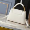 Mini Capucines Bag with Refined Monogram Flower on Handles, Crafted in Full-Grain Taurillon Leather