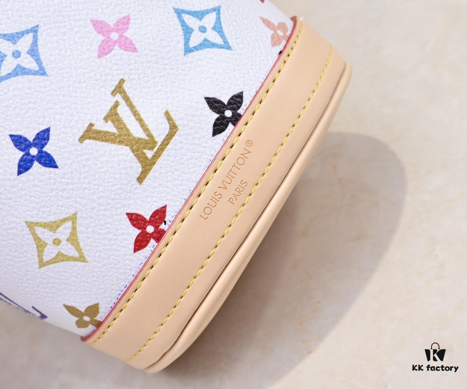 69305f4bf09edb6de4c5034c M81489 M13619 LV Longshang Village White Tricolor Upgrade Nano Bucket Bag from Match Series