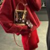 69305fc0f09edb6de4c50452 M81489 Lv Village Cherry Blossom Upgraded Nano Bucket Bag from Match Collection