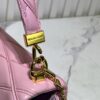 69305fd5f09edb6de4c5046b M23689 M22891 Nicolas Ghesquière infuses the GO-14 Medium Handbag with innovative craftsmanship, featuring quilted lambskin meticulously treated to achieve a baked finish, showcasing avant-garde elegance. The LV Twist lock highlights the brand's signature style, while the top handle and adjustable chain strap are both detachable, offering versatile carrying options. Dimensions: 23X16X10
