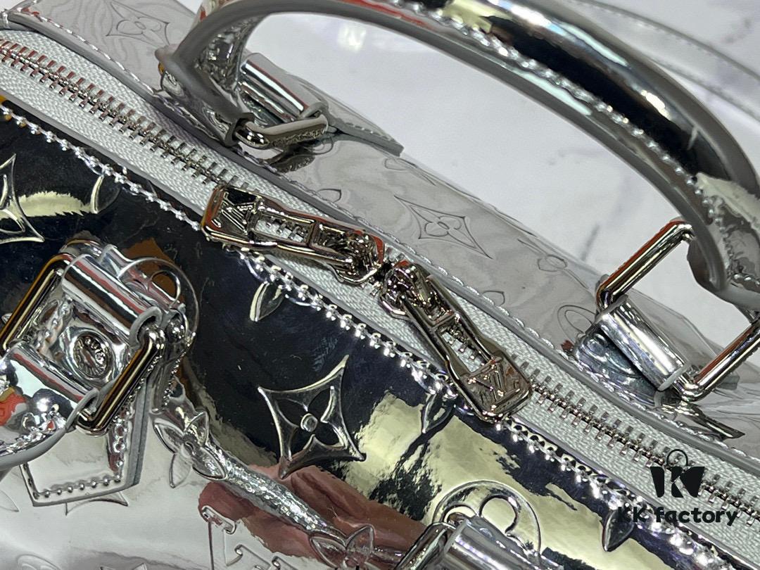 693060cbf09edb6de4c5061a M11987 M58953 Silver Speedy Bandoulière 20 Handbag from LV Ski Collection