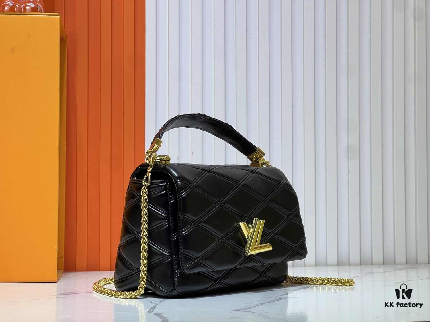 69306116f09edb6de4c506be M23689 M22891 Nicolas Ghesquière infuses the GO-14 Medium Handbag with innovative craftsmanship, featuring quilted lambskin meticulously treated to achieve a baked finish, expressing bold avant-garde style. The LV Twist lock adds signature brand elegance, while top handles and an adjustable chain strap are detachable, enabling multiple carrying options. Dimensions: 23X16X10