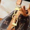 6930611bf09edb6de4c506c9 Noe Cargo Mini Upgrade Original Version M14199 M14017 – Compact Bucket Bag in Shiny Calfskin with Nylon-Like Sheen