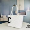 693064266e68136f4d9a4422 New Chanel Panda Carry Basket Bag in Classic Black and White