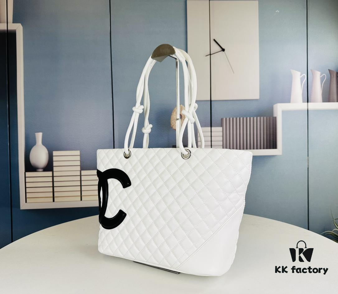 693064266e68136f4d9a4422 New Chanel Panda Carry Basket Bag in Classic Black and White
