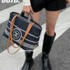 6930646a6e68136f4d9a4474 Large New Arrival CHANEL Navy Striped Denim Beach Tote Bag
