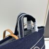 6930646e6e68136f4d9a4479 Small-sized New Arrival CHANEL Navy Blue Striped Denim Beach Tote Bag