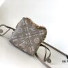 693065486e68136f4d9a45fb Pico Bella Bucket Bag in Perforated Calfskin Leather