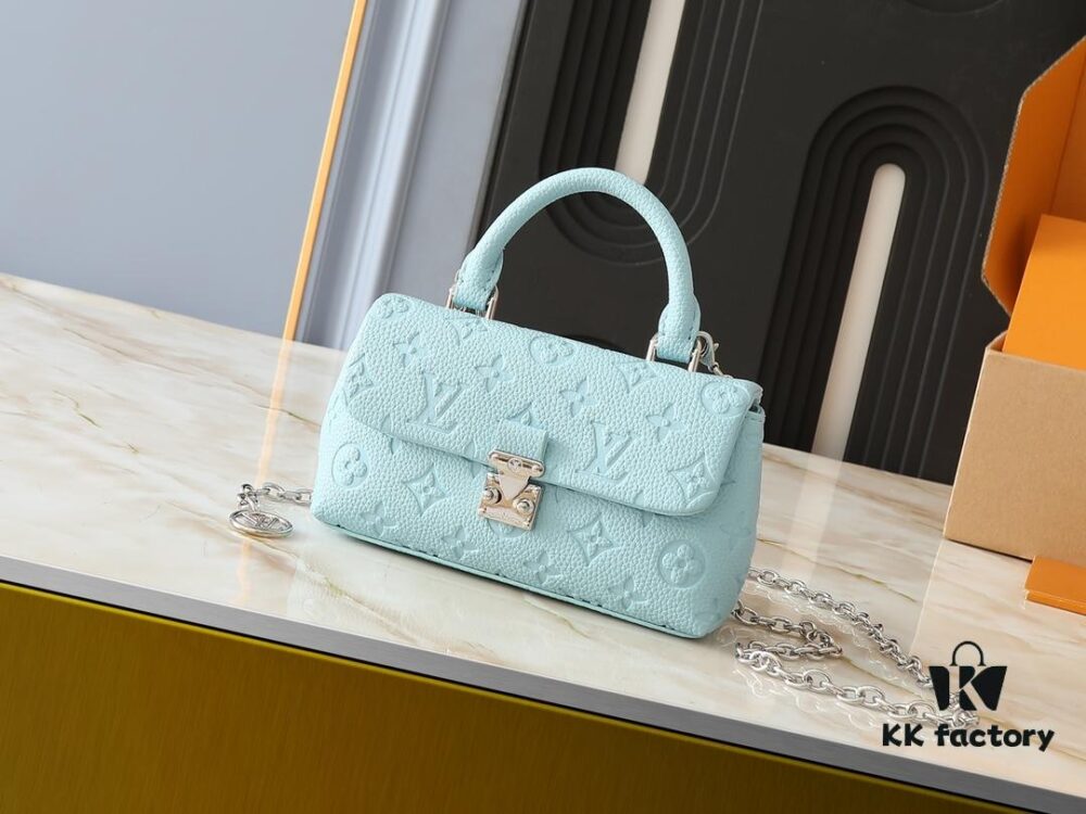 6930655e6e68136f4d9a4623 Upgraded Original Version M12145 White M12144 Black M12211 Blue This Nano Madeleine Bag Features a Miniaturized Interpretation of the Madeleine Bag Crafted in Monogram Empreinte Leather Complemented by a Classic S-Lock Closure and a Detachable Chain Accented with the LV Circle Signature Offering Ample Space for Daily Essentials and Can Be Carried as a Top Handle Crossbody or Shoulder Bag Dimensions: 12.5 x 6 x 21 cm (Height Width Length)