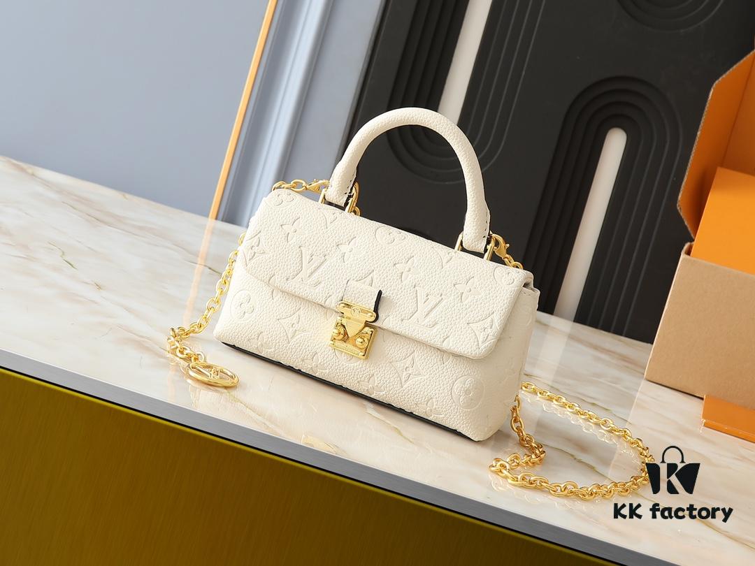 693065616e68136f4d9a462b Upgraded Original M12145 White M12144 Black M12211 Blue This Nano Madeleine Bag Features a Miniature Version of the Madeleine Bag Crafted in Monogram Empreinte Leather with a Classic S-Lock Clasp and a Detachable Chain Accented with the LV Circle Logo Ideal for Carrying Daily Essentials Offering Versatile Carrying Options as a Handbag Shoulder Bag or Crossbody Bag Size: 12.5 x 6 x 21 cm (Height Width Length)