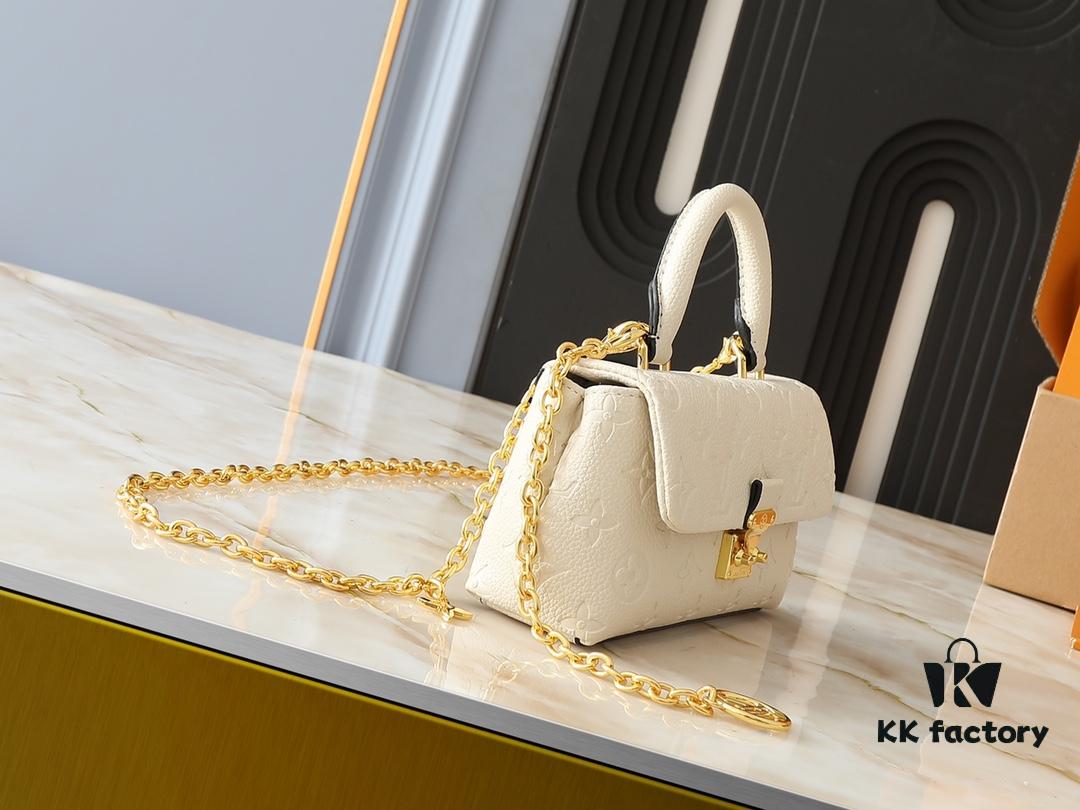 693065676e68136f4d9a4638 Upgraded Original M12145 White M12144 Black M12211 Blue This Nano Madeleine Bag Features a Miniature Version of the Madeleine Bag Crafted in Monogram Empreinte Leather with a Classic S-Lock Clasp and a Detachable Chain Accented with the LV Circle Logo Ideal for Carrying Daily Essentials Offering Versatile Carrying Options as a Handbag Shoulder Bag or Crossbody Bag Size: 12.5 x 6 x 21 cm (Height Width Length)