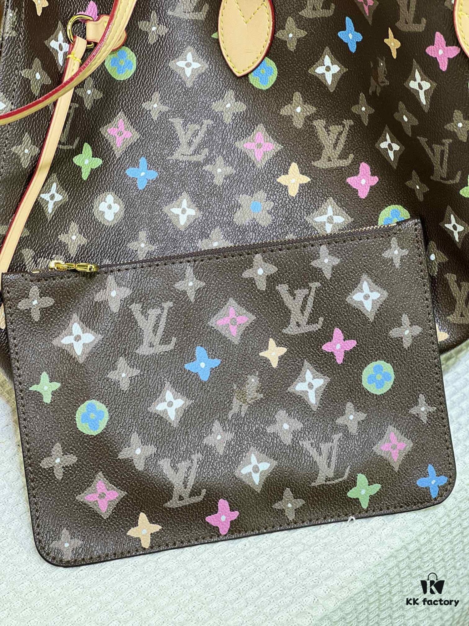 693066f26e68136f4d9a493c Monogram Tote MM Handbag with Monochrome Stripes and LVs on Pink Background
