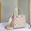 693067926e68136f4d9a4a51 M46373 OnTheGo PM Handbag from the Sunrise Aquarelle Collection