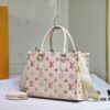 693067936e68136f4d9a4a52 M46373 OnTheGo PM Handbag from the Sunrise Aquarelle Collection
